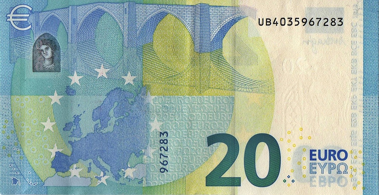 Banconota da 20 euro con simbolo di avvertimento evidenziato per identificare possibili contraffazioni.
